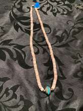 Conch shell and Navajo disc with in a turquoise necklace 18 inches