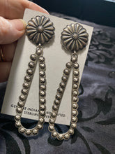 "The Sterling silver Flower" dangles ￼