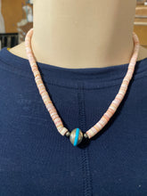 Conch shell and Navajo disc with in a turquoise necklace 18 inches