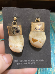 The 14k Gold Elk Ivory earrings.