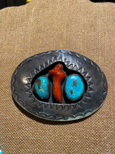 The vintage, old pawn, sterling silver, and turquoise belt buckle