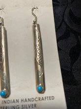 Long Sterling silver earrings with 1 snake eye Kingman Turquoise and each earring