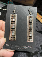 Wire dangle, earrings, Thomas Charlie