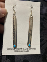 Long Sterling silver earrings with 1 snake eye Kingman Turquoise and each earring