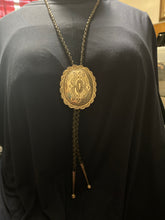 Sterling silver Concho bolo created by Carson Black goat