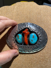 The vintage, old pawn, sterling silver, and turquoise belt buckle