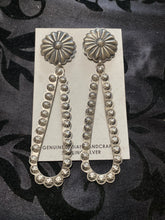 "The Sterling silver Flower" dangles ￼