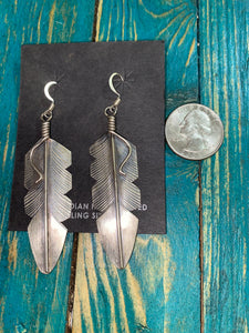 "The Sterling Silver Feather” earrings