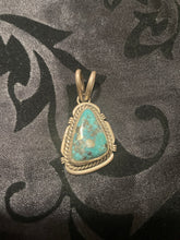 The J Begay pendant/charms