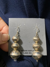 The Sterling silver handmade three tool bead earrings