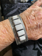 White Buffalo Band cuff bracelet.