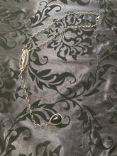 The white bronze and black Onyx, long lariat necklace