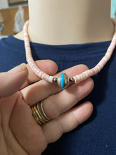 Conch shell and Navajo disc with in a turquoise necklace 18 inches