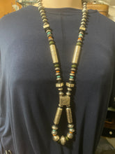 Large multi shaped tube bead necklace with turquoise  and Spiny Oyster pieces.