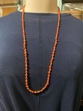 Red coral necklace with sterling silver beads, and a sterling silver class 30 inches long