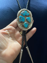 Four beautiful turquoise Stones creating a cluster in a bolo ￼