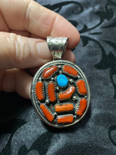 Beautiful red coral with one nugget of turquoise Pendant