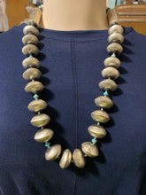The Sterling silver multi disks and tubes necklace with tiny TURQUOISE pieces AND tiny NAVJO PEARL BEADS NECKLACE