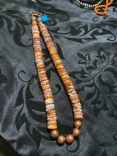 Light orange spiny oyster and copper bead necklace 16 inches long ￼
