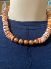 Light orange spiny oyster and copper bead necklace 16 inches long ￼