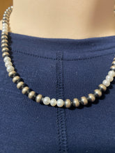 Freshwater pearls and 6 mm Navajo pearls 18  in