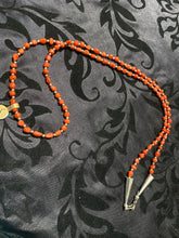 Red coral necklace with sterling silver beads, and a sterling silver class 30 inches long