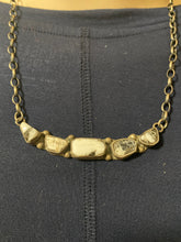 The white buffalo turquoise choker 18 inches long