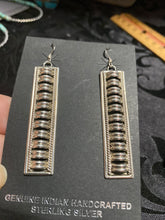 Wire dangle, earrings, Thomas Charlie
