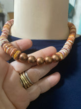 Light orange spiny oyster and copper bead necklace 16 inches long ￼