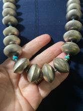 The Sterling silver multi disks and tubes necklace with tiny TURQUOISE pieces AND tiny NAVJO PEARL BEADS NECKLACE