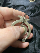 The Naja pendant with a turquoise center drop