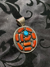 Beautiful red coral with one nugget of turquoise Pendant