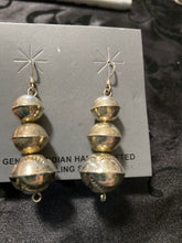 The Sterling silver handmade three tool bead earrings