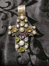 “The Freshwater Pearl and multiple Gem Stones set in a sterling silver cross