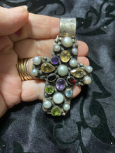 “The Freshwater Pearl and multiple Gem Stones set in a sterling silver cross
