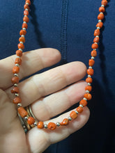 Red coral necklace with sterling silver beads, and a sterling silver class 30 inches long