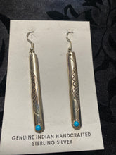 Long Sterling silver earrings with 1 snake eye Kingman Turquoise and each earring