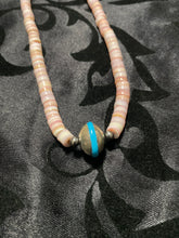 Conch shell and Navajo disc with in a turquoise necklace 18 inches