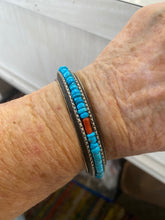 Heavy sterling silver Tufa  bracelet with turquoise and coral chips