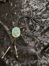 Four beautiful turquoise Stones creating a cluster in a bolo ￼