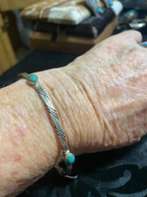 Simple but elegant sterling silver five stoned bangle