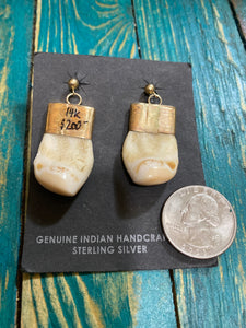 The 14k Gold Elk Ivory earrings.