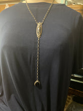The white bronze and black Onyx, long lariat necklace