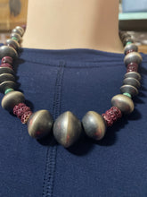 Purple Spiny, oyster, turquoise, disc, and Navajo pearls 20 inches long