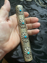 The long sterling silver Native American made with turquoise ponytail jewelry