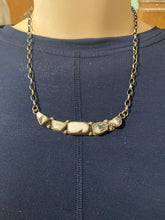 The white buffalo turquoise choker 18 inches long