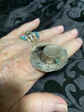 Sterling silver, cowboy hat rings with a snake eye turquoise