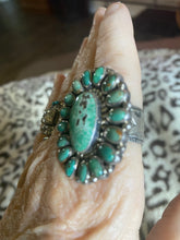 The TJ cluster ring