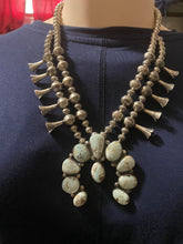 Dry Creek squash, blossom necklace with two strands of beads