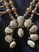 Dry Creek squash, blossom necklace with two strands of beads